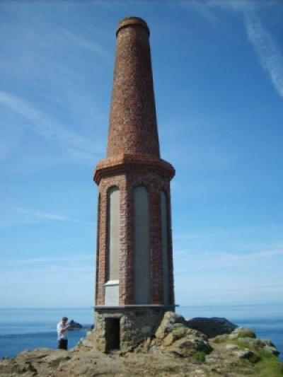 Historic mine stack from 19th century mine overlooks Cape Cornwall