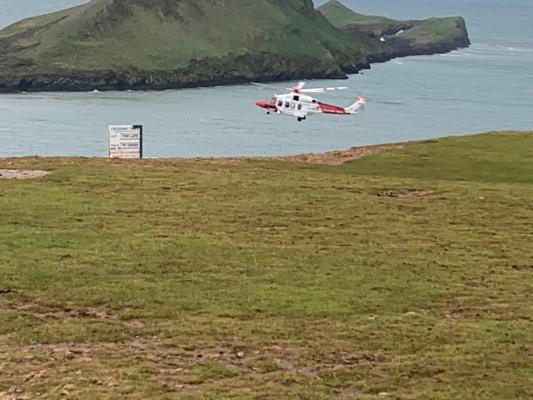 Rescue 187 flying past NCI Worms Head towards Kitchen Corner 