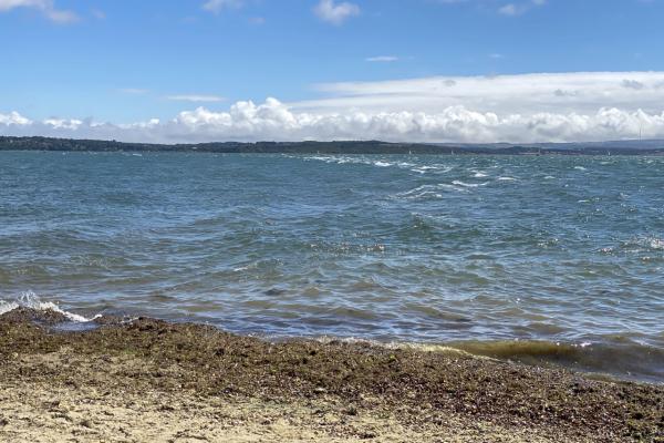 A strong ebb current flowing over Lepe Spit