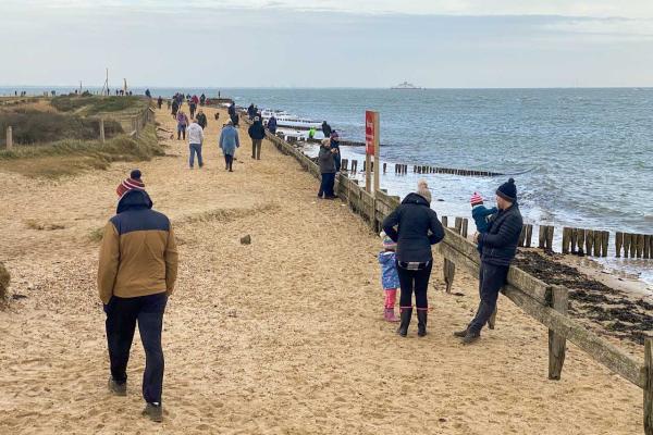 People walking at Lepe on New Years Day