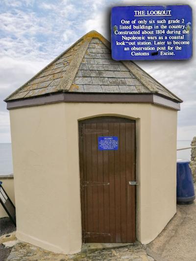 The station entrance with the door plaque