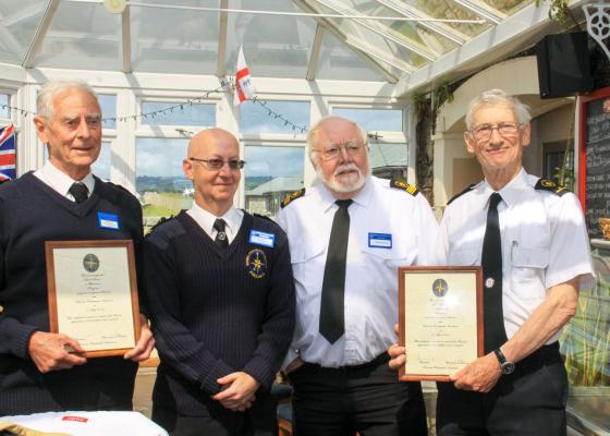 Long Service Awards are presented by Trustee Alan Richards during "Beach Day"