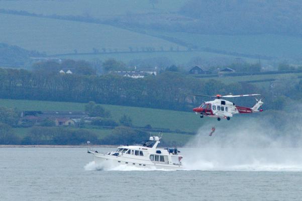 NCI Stone Point watches helicopter CG175 on exercise off the station