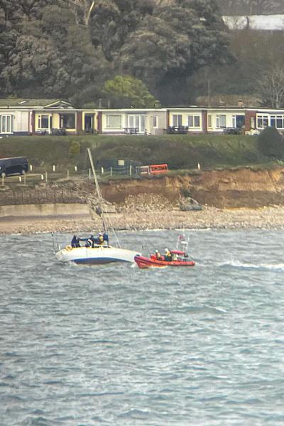 Yacht aground at Solent Breezes seen through a station telescope