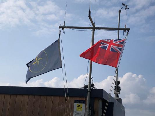 Red Ensign flown on D-Day in Honour of the Merchant Navy lives lost