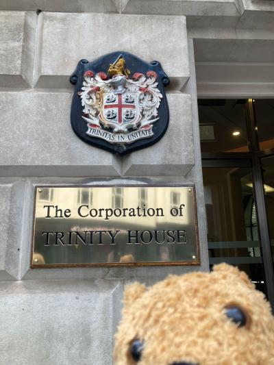 Our mascot "Ted" delivers the NCI 30th Anniversary Flag at Trinity House